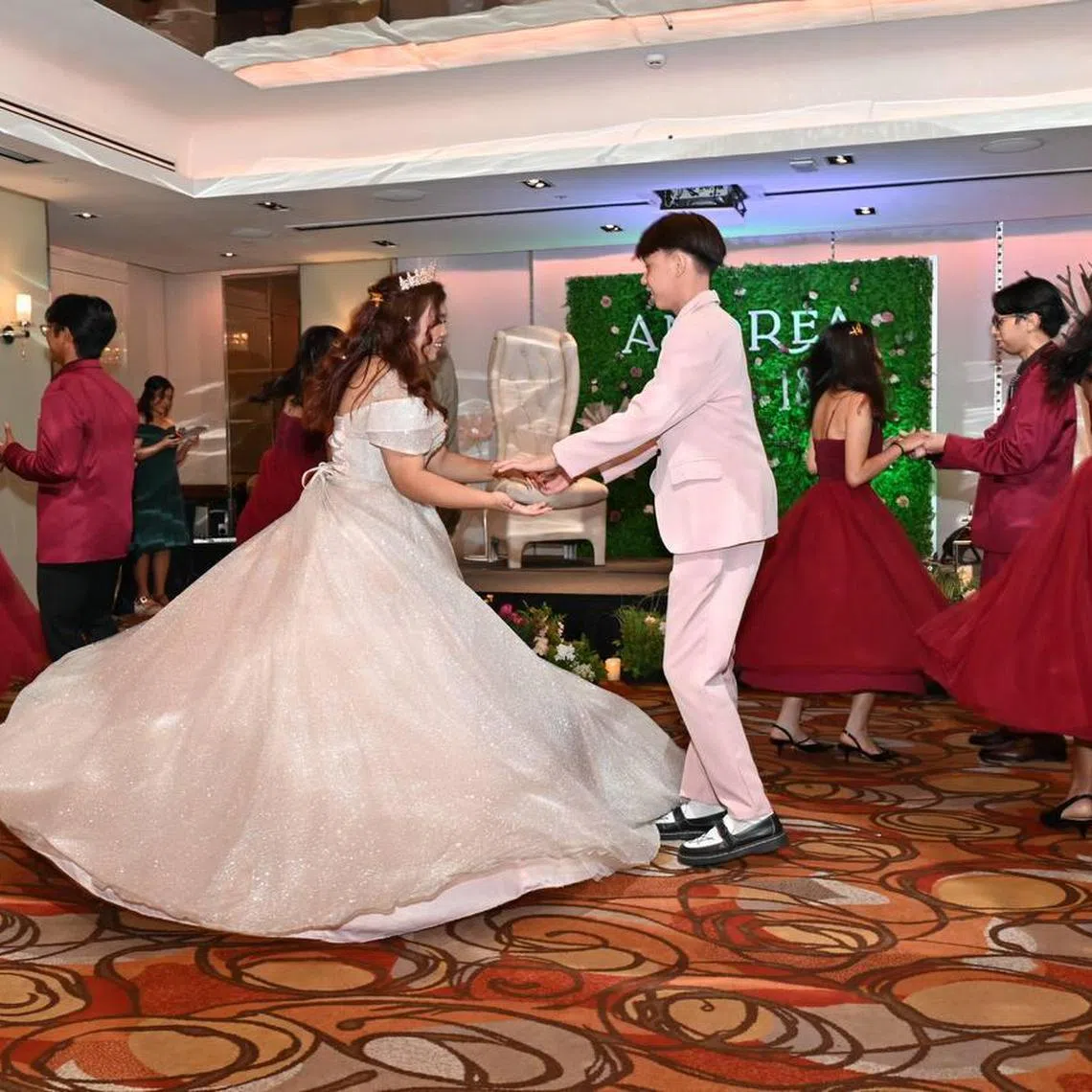 Temasek Polytechnic student Andrea Din’s debut was themed after an enchanted garden. During the event, she danced and sang with her friends. In Filipino culture, this big coming-of-age bash for girls is known as a debut (pronounced the BOO). It is a joyous gathering that is often planned and celebrated by the birthday girl’s family and friends.