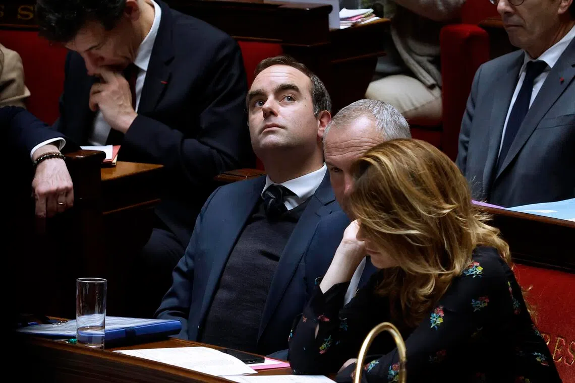 French lawmakers pass social security Budget in knife-edge vote