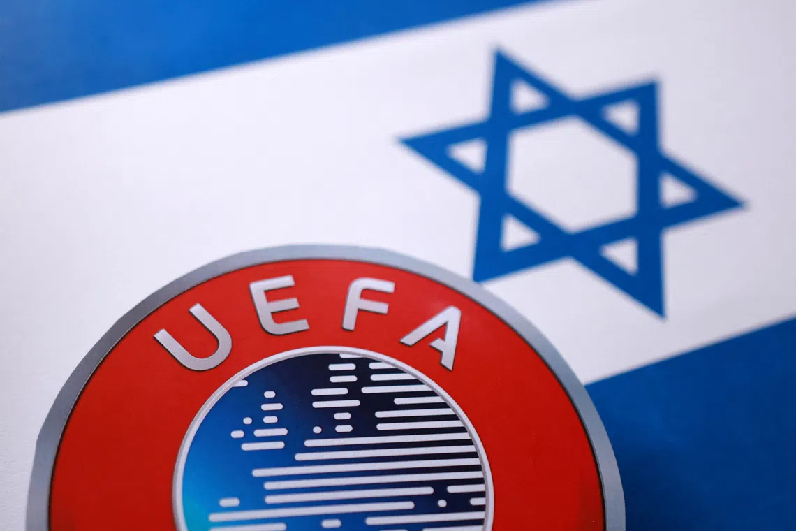 Israeli flag and UEFA logo are seen in this illustration taken September 30, 2025. REUTERS/Dado Ruvic/Illustration