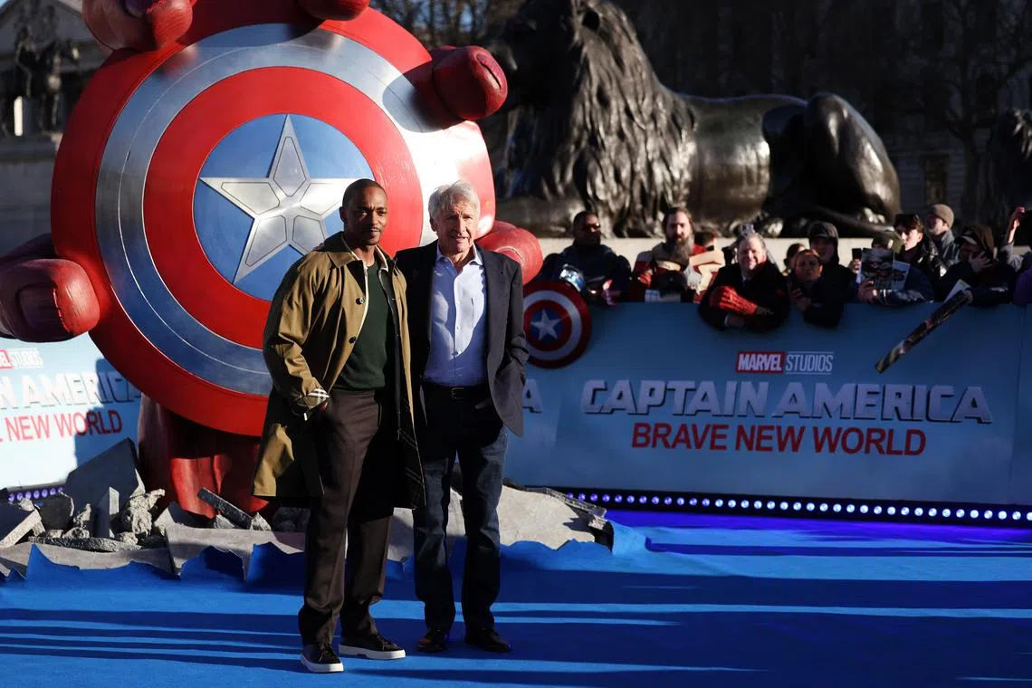 epa11863125 U.S actors Anthony Mackie (L) with Harrison Ford (R) attend the Captain America: Brave New World photocall at Trafalgar Square in London, Britain, 30 January 2025. Captain America:Brave New World is released in UK cinemas 14 February.  EPA-EFE/ANDY RAIN