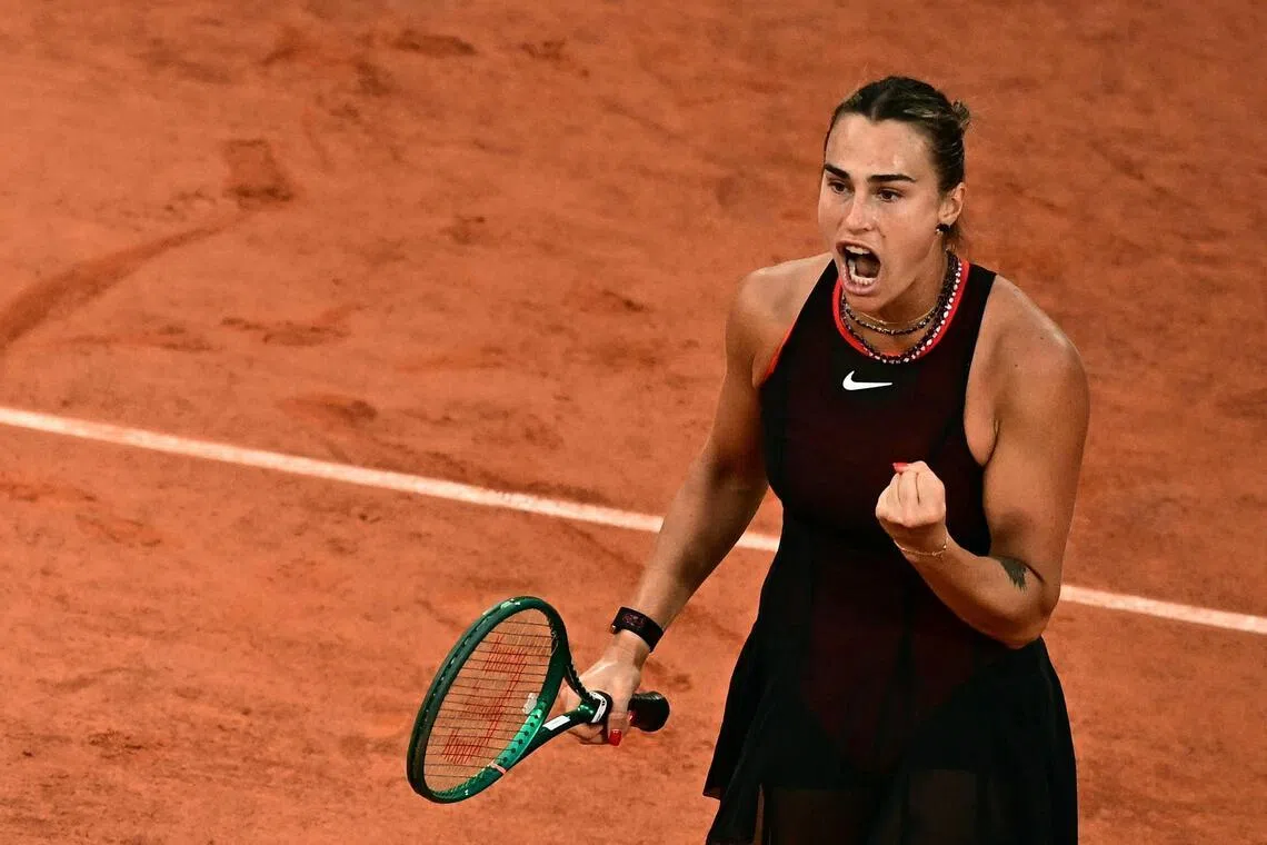 Aryna Sabalenka reacts to a point against Japan's Naomi Osaka during their French Open match.