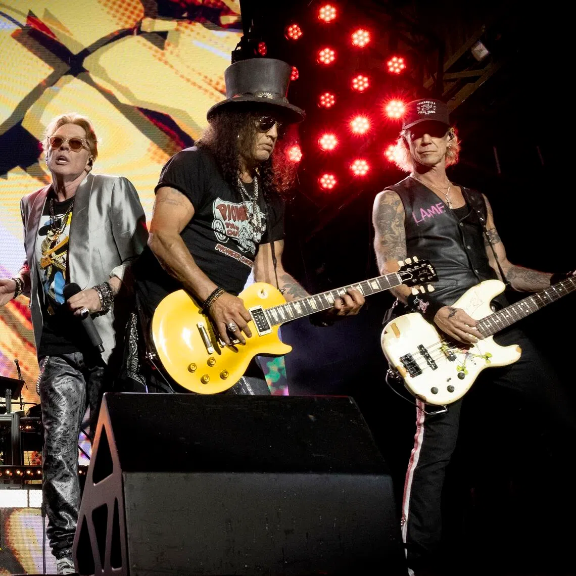 American band Guns N’ Roses includes the classic line-up of (from left to right) singer Axl Rose, guitarist Slash and bassist Duff McKagan.