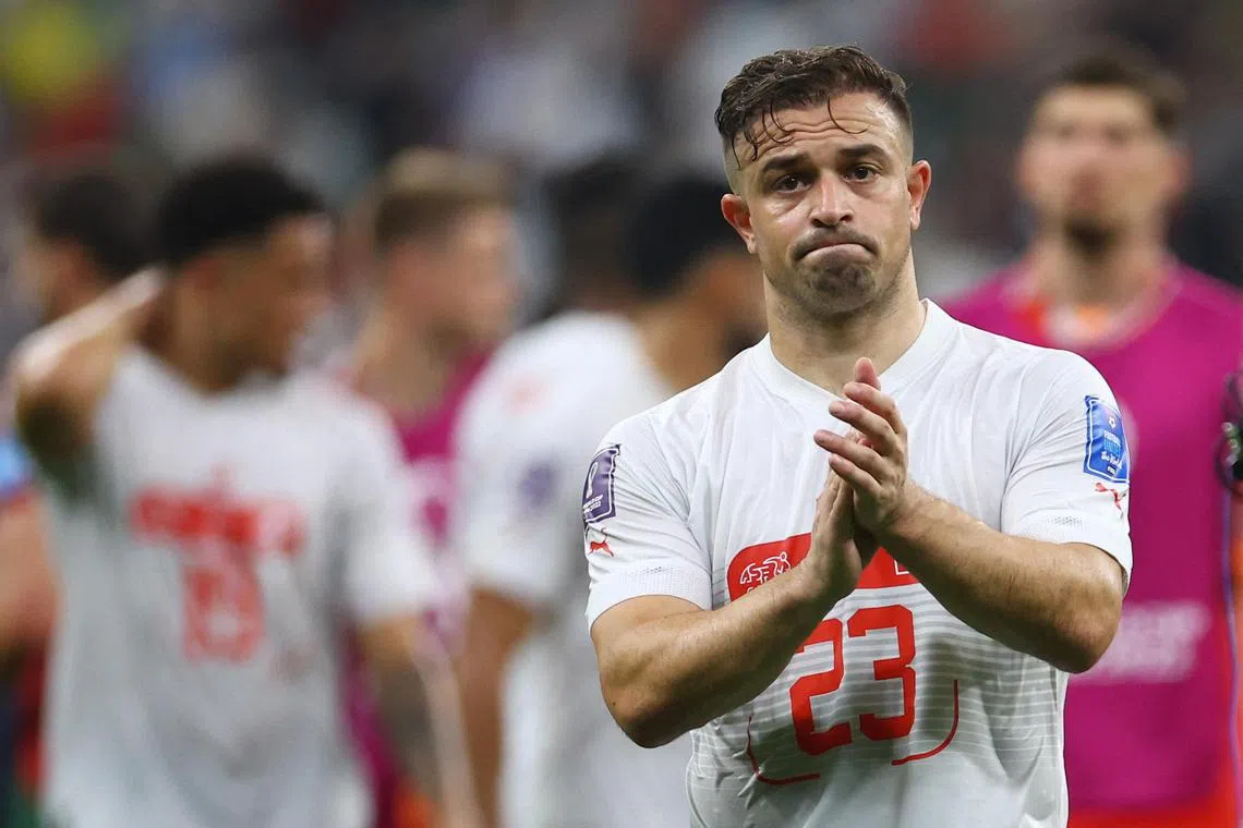 Switzerland's Xherdan Shaqiri looks dejected after the match as Switzerland are eliminated from the World Cup.