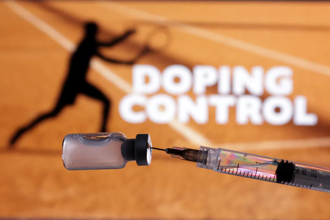 Silhouette of tennis player, vial and syringe and words \"Doping Control\" are seen in this illustration taken May 6, 2025. REUTERS/Dado Ruvic/Illustration