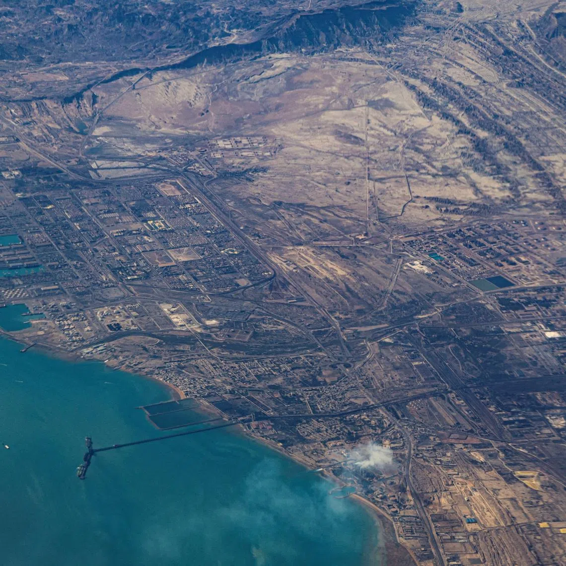 FILE PHOTO: An aerial view Port of Fujairah, United Arab Emirates in the strait of Hormuz, December 10, 2023. REUTERS/Stringer/File Photo