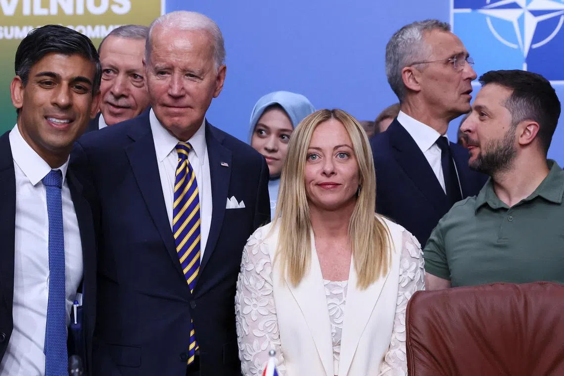 US President Joe Biden (centre left) and Italian Prime Minister Giorgia Meloni at a Nato leaders summit in Lithuania.