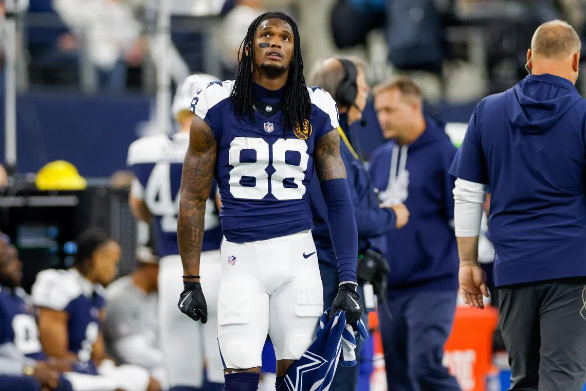 Nov 28, 2024; Arlington, Texas, USA; Dallas Cowboys wide receiver CeeDee Lamb (88) looks up at the scoreboard during the first quarter against the New York Giants at AT&T Stadium. Andrew Dieb-Imagn Images/File Photo