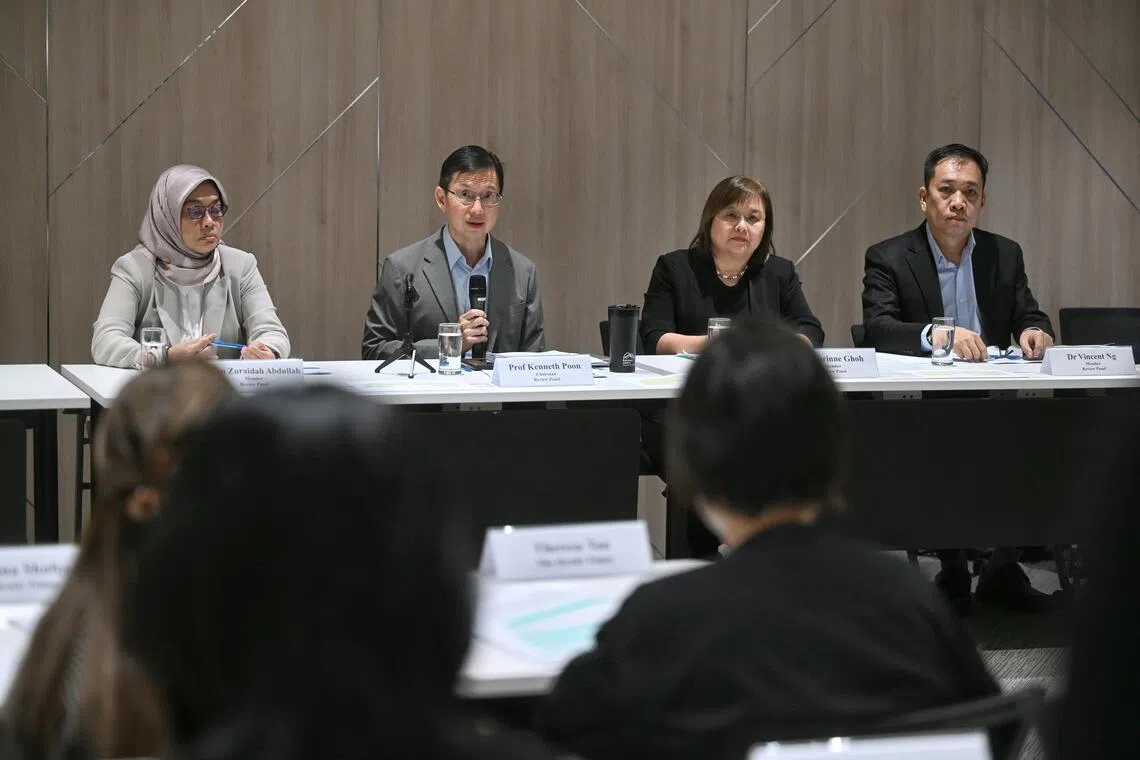 Professor Kenneth Poon (second from left), chairman of the panel reviewing the Megan Khung case, speaking at a press conference on the panel's report. With him are panel members (from left) Zuraidah Abdullah, Corinne Ghoh and Vincent Ng.