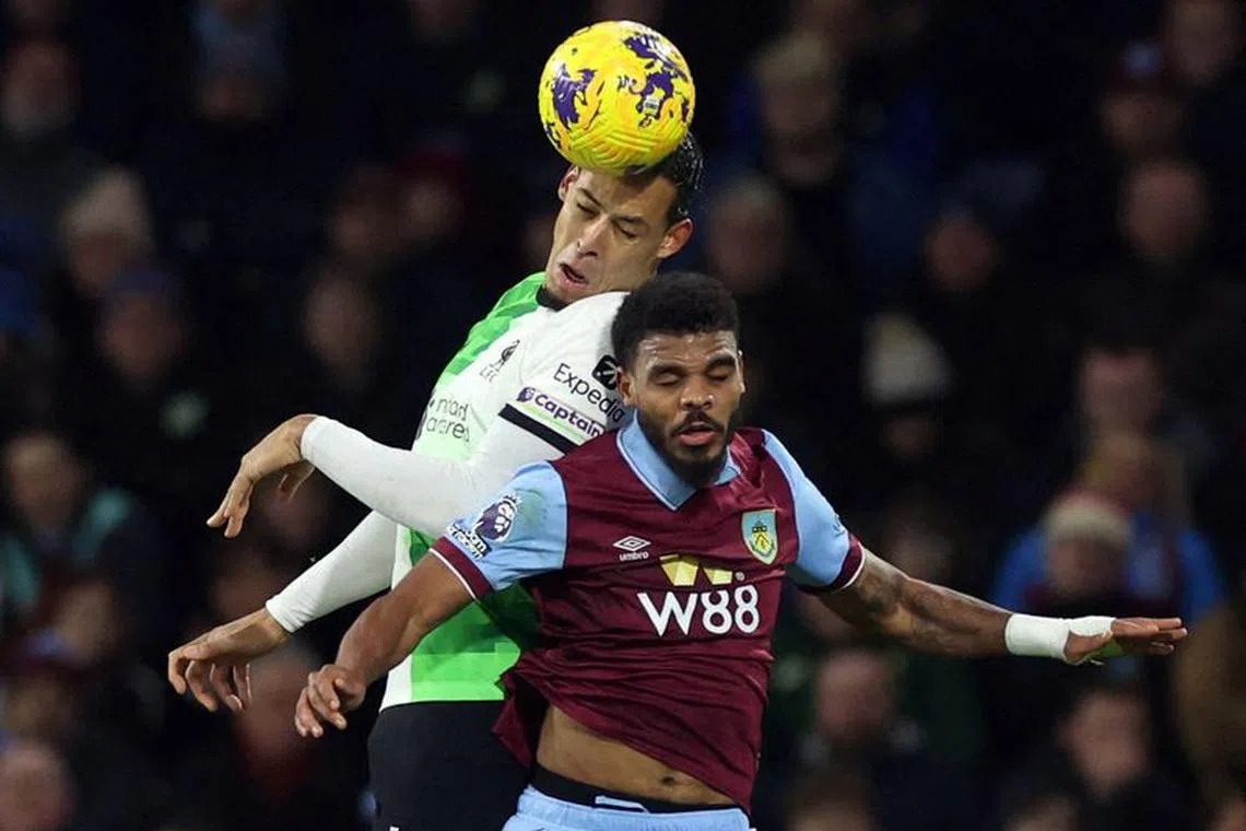FILE PHOTO: Soccer Football - Premier League - Burnley v Liverpool - Turf Moor, Burnley, Britain - December 26, 2023 Burnley's Lyle Foster in action with Liverpool's Virgil van Dijk REUTERS/Phil Noble/ File Photo