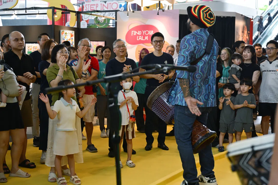 DPM and Minister for Trade and Industry Gan Kim Yong (centre, left) and Mayor of North East District Baey Yam Keng (centre, right) at the sixth edition of Shaping Hearts at Punggol Digital District on Sept 13.