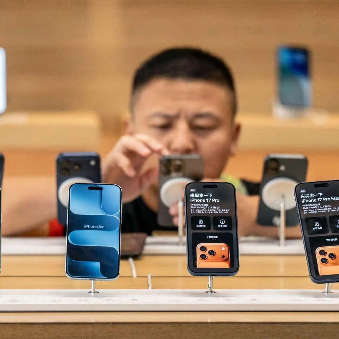 Apple said it expects iPhone revenue to grow by double-digits year over year in the December quarter.