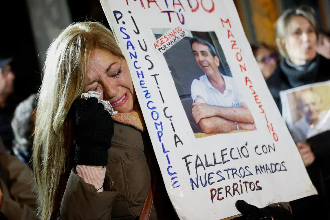 Mrs Victoria Sanchez, whose husband and dogs died in the October 2024 floods, reacts during a minute of silence held at the end of the rally, which was held to demand the resignation of Valencia regional leader Carlos Mazon.