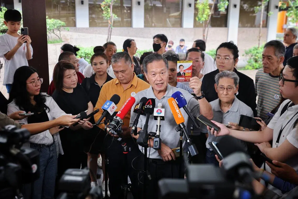 Presidential candidate Tan Kin Lian speaking to the media at Hougang Central on Aug 30, 2023.