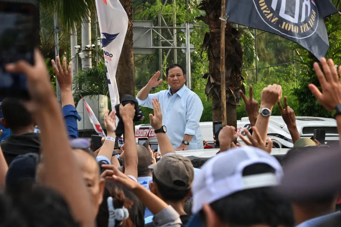Presidential Candidate Prabowo Subianto interacting with supporters as he leaves Gelora Bung Karno Stadium after his last mega rally / campaign on Feb 10, 2024. / Prabowo's last grand rally/campaign at The National Stadium / Gelora Bung Karno Stadium (GBK) on Feb 10, 2024. / ibrally / /2024 Indonesia Presidential Election.