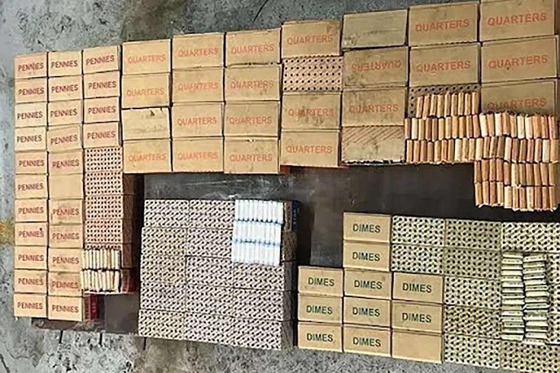 More than US$20,000 worth of coins boxed and rolled, before being dumped loosely into a metal container, according to court papers. 