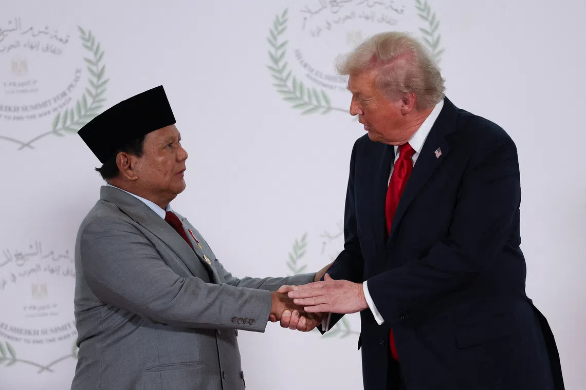 US President Donald Trump and Indonesian President Prabowo Subianto at a world leaders' summit in Sharm el-Sheikh, Egypt, Oct 13.