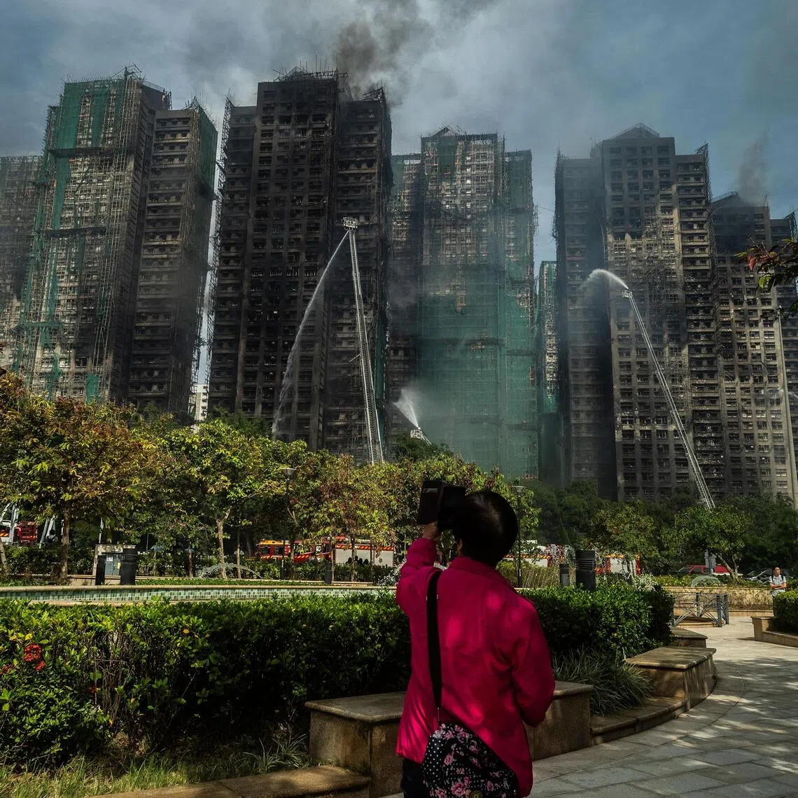 FILE Ñ Smoke rises from the Wang Fuk Court residential complex in Hong Kong on Nov. 27, 2025. BeijingÕs national security arm in Hong Kong summoned representatives and journalists from some foreign media organizations, including The New York Times, on Dec. 6 to warn them about coverage of the cityÕs deadliest fire in decades as well as of upcoming legislative elections. (Lam Yik Fei/The New York Times)