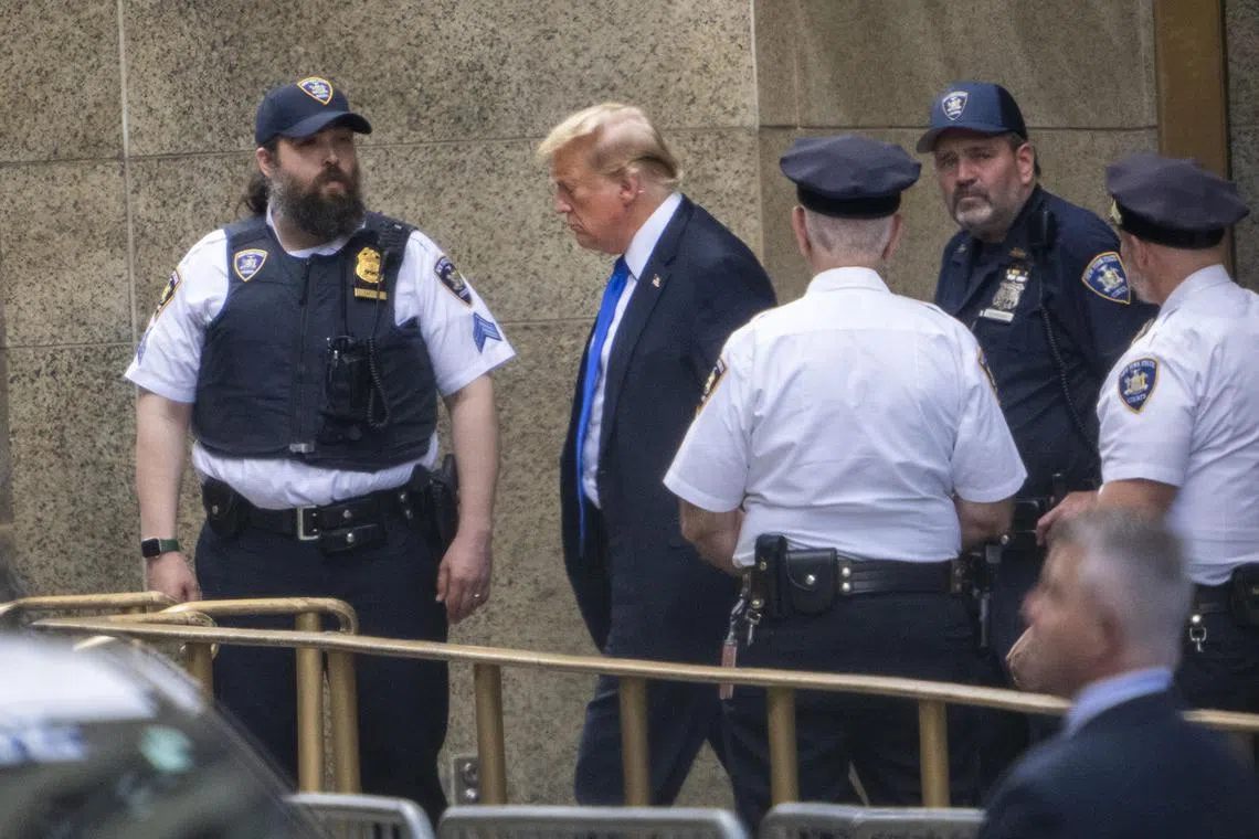 HEADLINE: Manhattan Jury Finds Trump Guilty on All 34 Counts
CAPTION: Former President Donald Trump exits the courthouse after being found guilty of all counts in his criminal trial at New York State Supreme Court in Manhattan on Thursday, May 30, 2024. Trump was convicted of falsifying records to cover up a sex scandal that threatened his ascent to the White House in 2016.
CREDIT:  (Doug Mills/The New York Times)