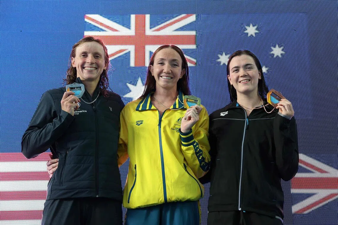 (From left_ Katie Ledecky of the US, Australia’s Lani Pallister and Erika Fairweather of New Zealand with their respective silver, gold and bronze medals on Aug 14.
