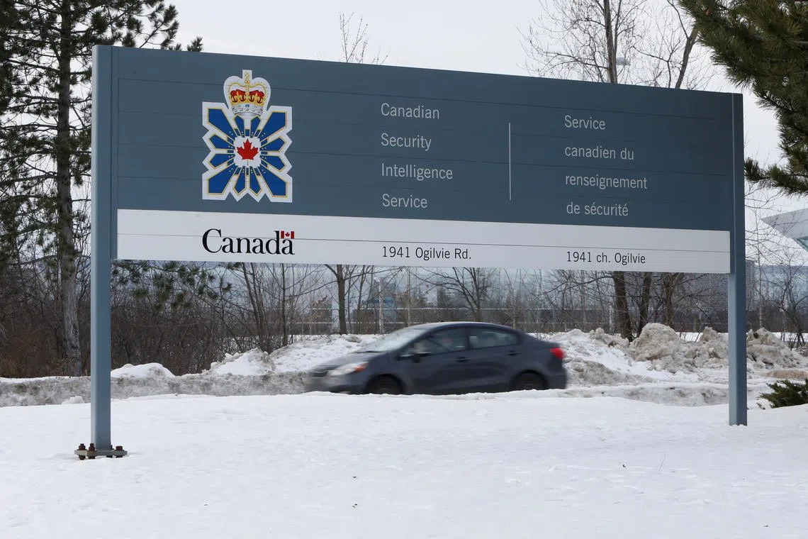 FILE PHOTO: A vehicle passes a sign outside the Canadian Security Intelligence Service (CSIS) headquarters in Ottawa, Ontario, Canada January 17, 2017. REUTERS/Chris Wattie/File Photo