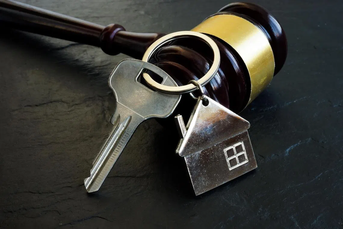tenant - Property litigation and Disputes concept. Key from home and gavel.