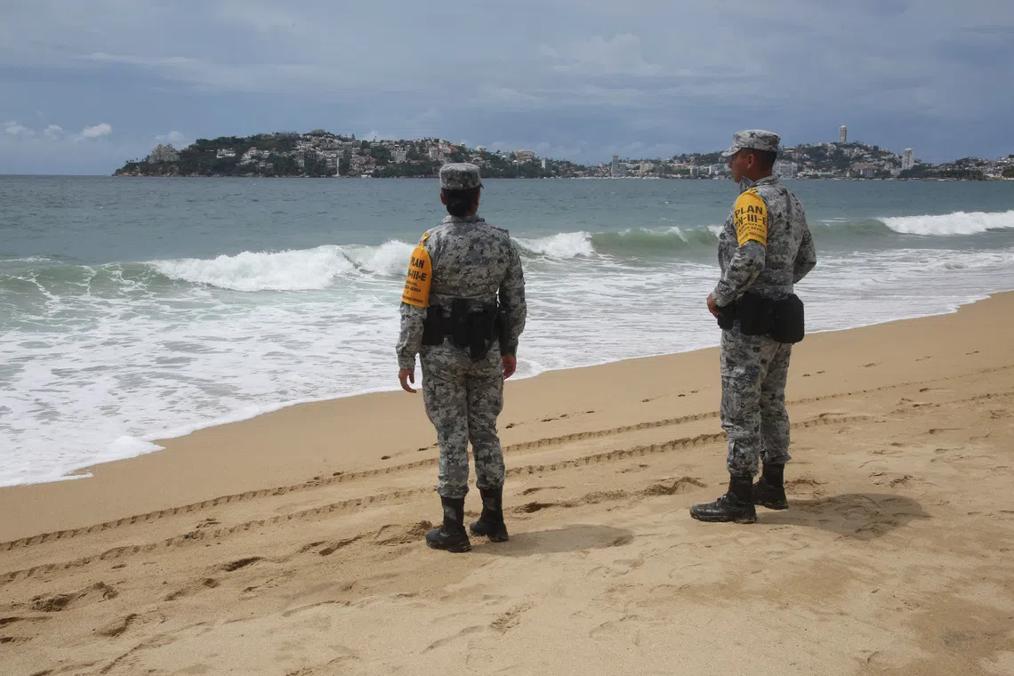 Outer rainbands of major hurricane Polo reach Mexico's coast