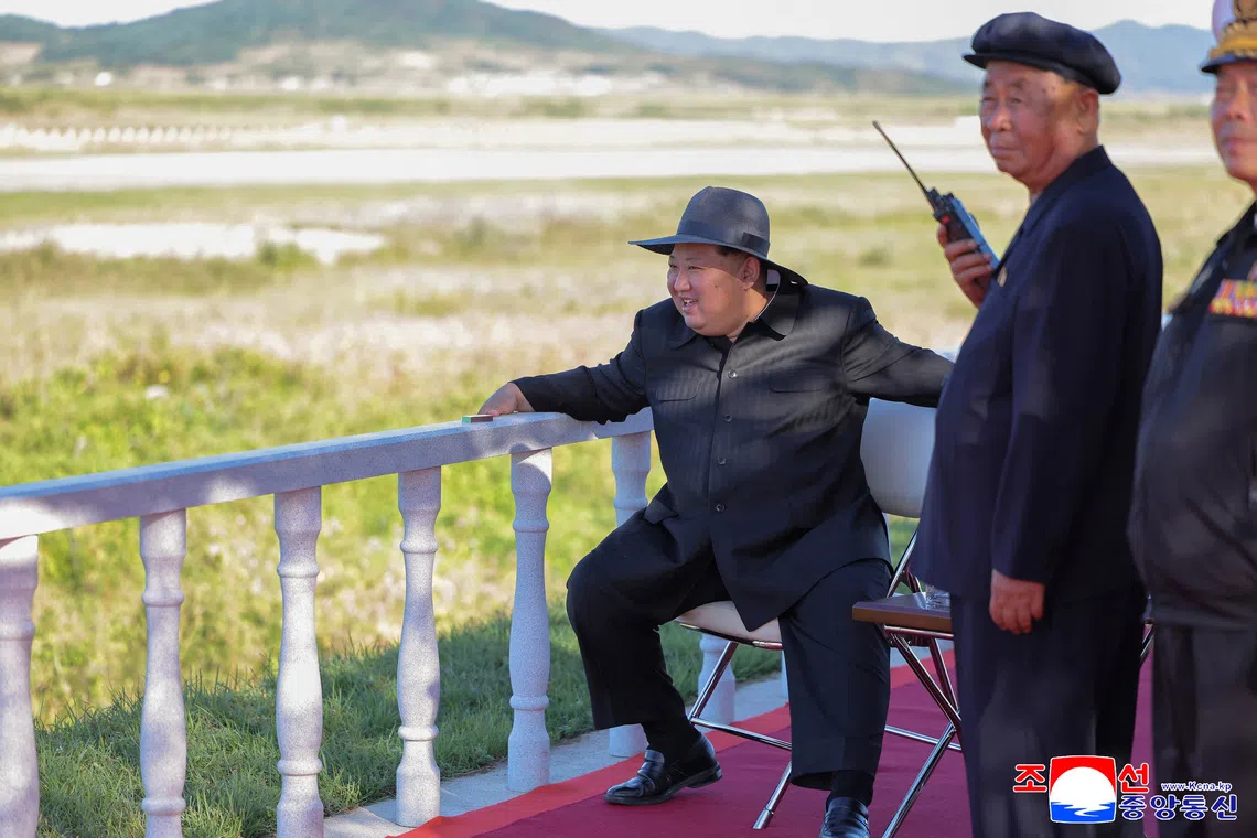 North Korean leader Kim Jong Un oversees the testing of drones at an undisclosed location, in North Korea, September 18, 2025, in this picture released by the Korean Central News Agency. KCNA via REUTERS