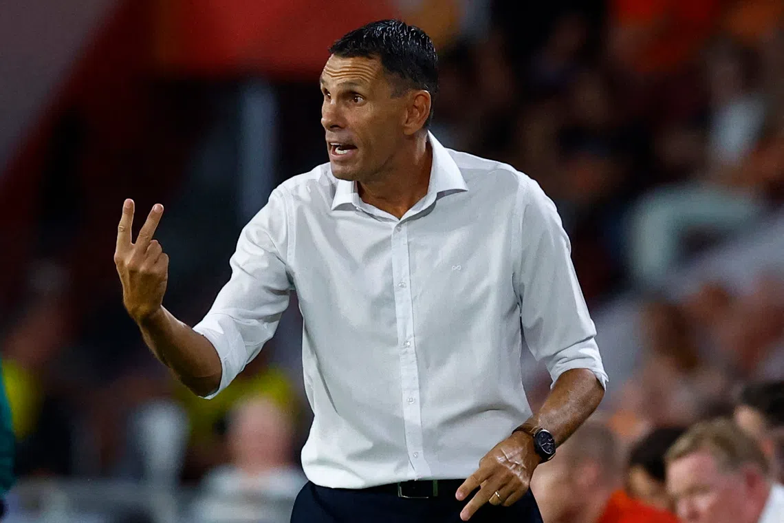 Soccer Football - Euro 2024 Qualifier - Group B - Netherlands v Greece - Philips Stadium, Eindhoven, Netherlands - September 7, 2023 Greece coach Gus Poyet gestures REUTERS/Piroschka Van De Wouw