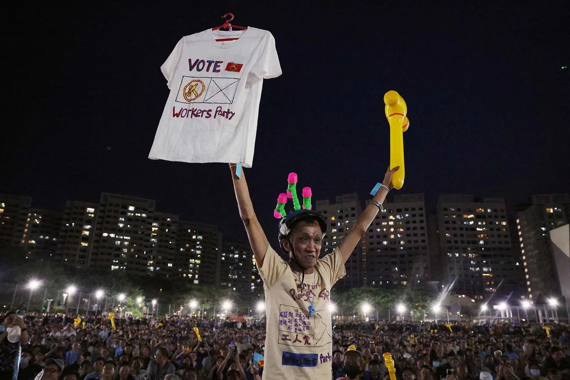 Workers' Party supporters attending a rally ahead of the general election in Singapore, April 28, 2025. 