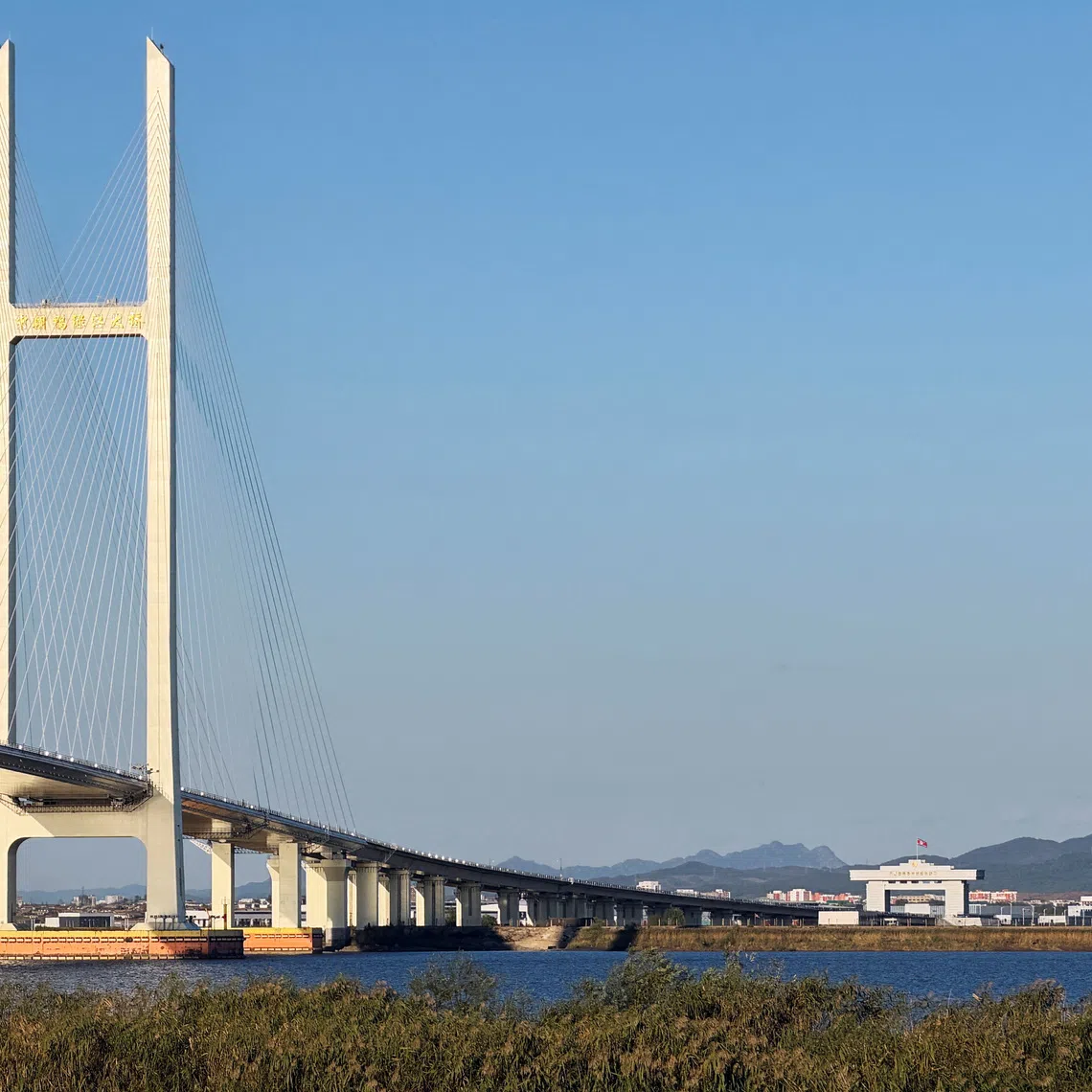 The New Yalu River Bridge, designed to connect China’s Dandong New Zone and North Korea’s Sinuiju, on Oct 5. Neither country has set a date to open the bridge.