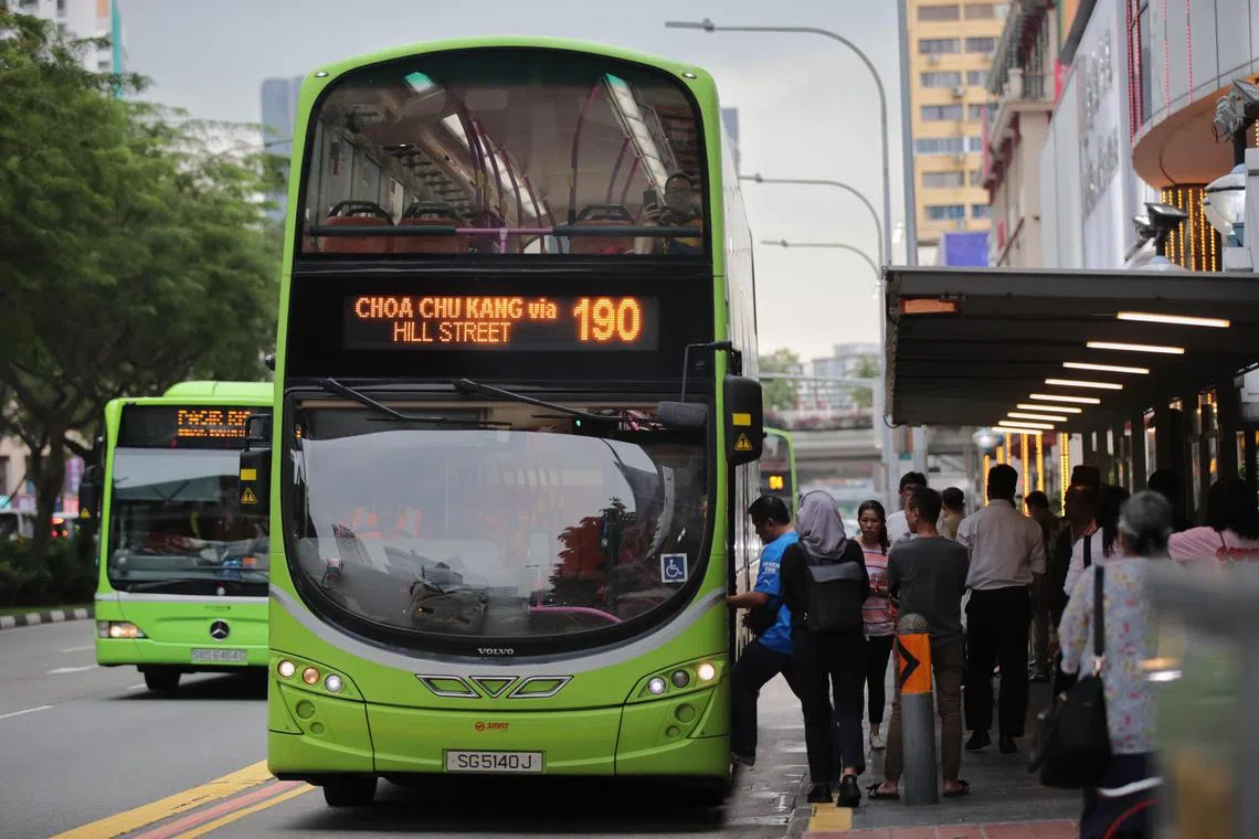 Generic photo of people boarding SMRT double decker bus number 190 at a bus stop on 5 Apr 2023. 
Can use for stories about public buses, transportation, fare hike, inflation, traveling, LTA, COE, SBS Transit, SMRT Buses, Tower Transit Singapore, riders, bus route, 