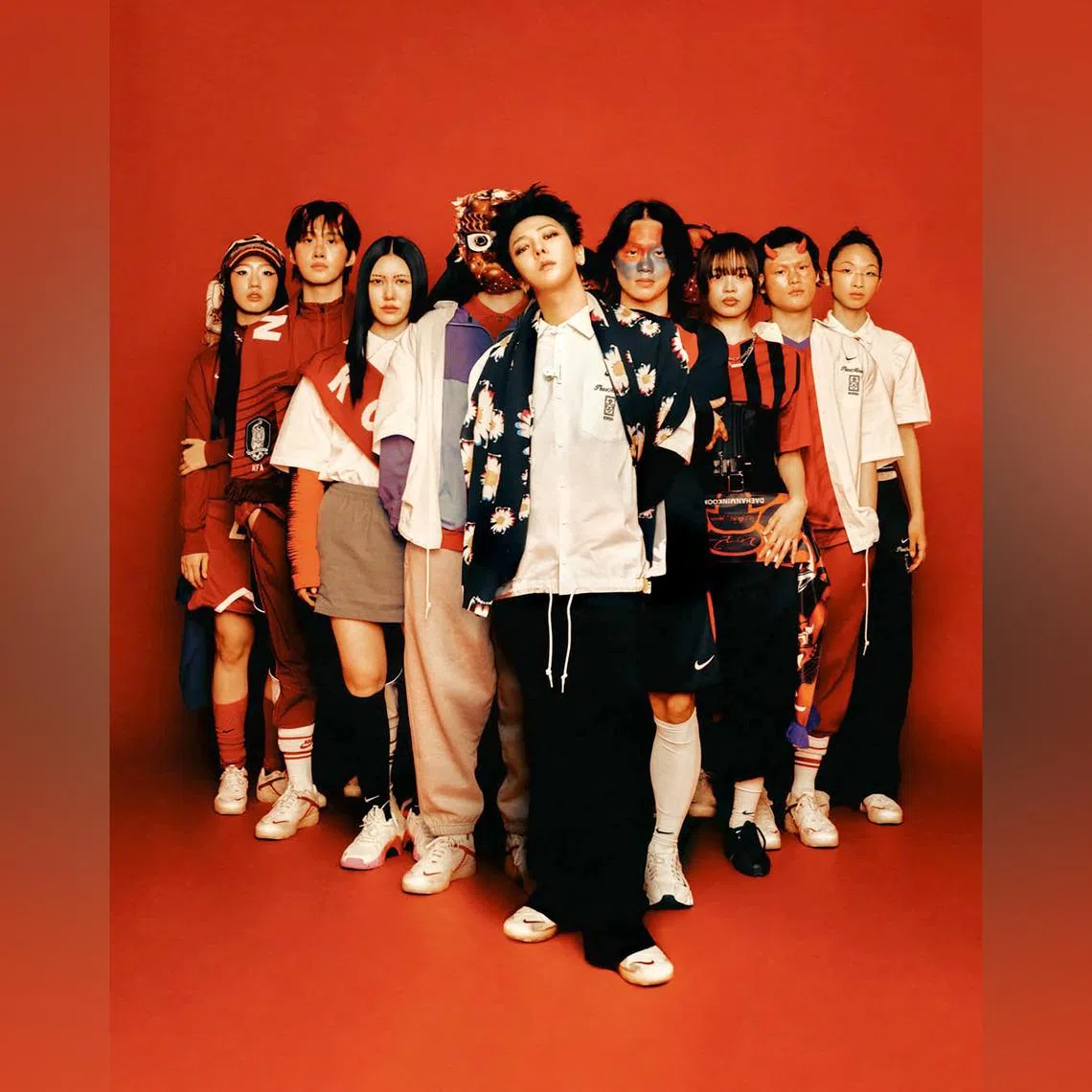 K-pop idol G-Dragon (centre) teamed up with Nike and the Korea Football Association for a capsule streetwear collection.