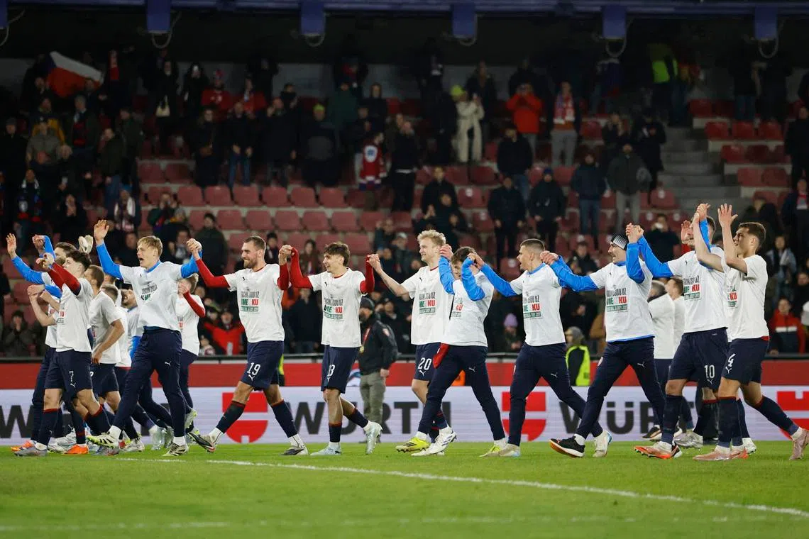 Soccer Football - FIFA World Cup - UEFA Qualifiers - Finals - Czech Republic v Denmark - epet ARENA, Prague, Czech Republic - March 31, 2026 Czech Republic players celebrate after qualifying for the FIFA World Cup REUTERS/David W Cerny