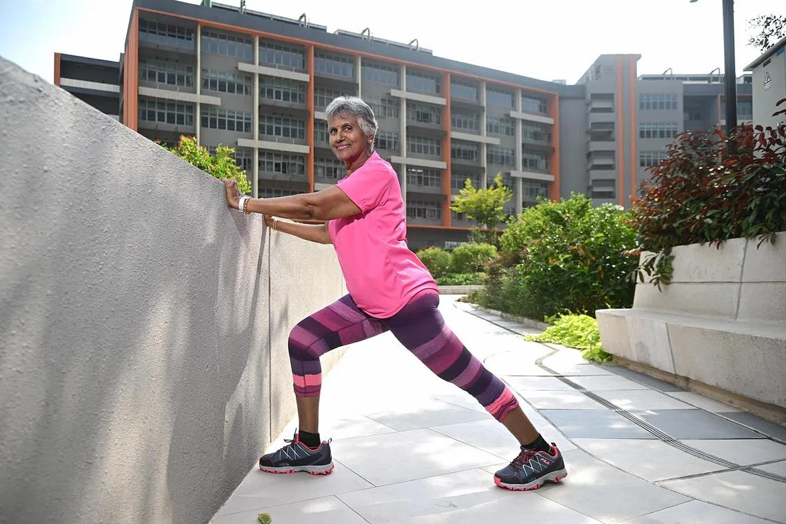 Madam Muthiah Vasanthakumari, 73, exercising at Woodlands Health Campus on Oct 24, 2024. She has osteoporosis and does yoga and brisk walking to help with bone density.