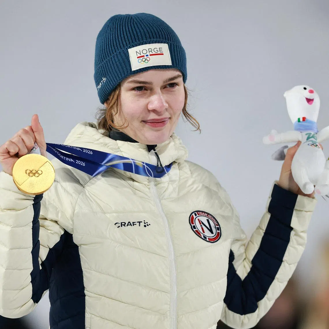 Milano Cortina 2026 Olympics - Ski Jumping - Women's Normal Hill Individual Victory Ceremony - Predazzo Ski Jumping Stadium, Predazzo, Italy - February 07, 2026. Gold medallist Anna Odine Stroem of Norway celebrates on the podium after winning the Women's Normal Hill Individual REUTERS/Stephanie Lecocq