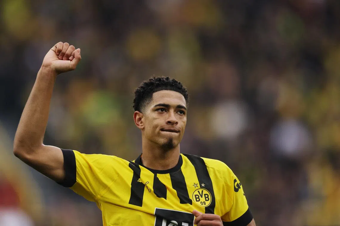 Borussia Dortmund's Jude Bellingham celebrates scoring their first goal against Eintracht Frankfurt.