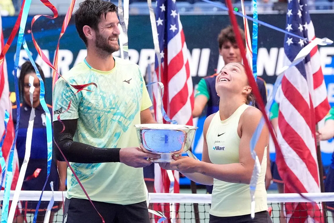 FILE PHOTO: Sept 5 2024; Flushing, NY, USA;    Sara Errani and Andrea Vavassori (ITA) with the US Open trophy after beating Donald Young and Taylor Townsend (USA) in the Mixed Doubles Final on day eleven of the 2024 U.S. Open tennis tournament at USTA Billie Jean King National Tennis Center. Mandatory Credit: Robert Deutsch-Imagn Images/File Photo