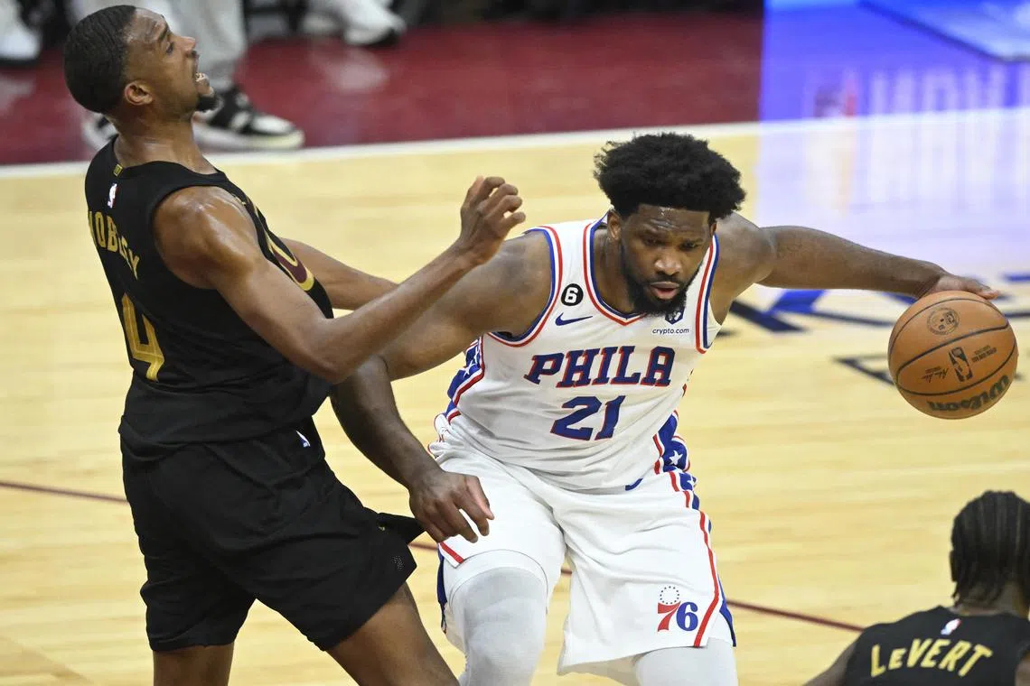 Philadelphia 76ers centre Joel Embiid colliding with Cleveland Cavaliers forward Evan Mobley as the Sixers clinch a 118-109 win. 