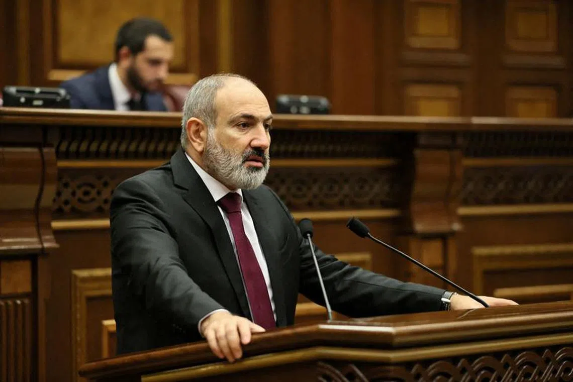 FILE PHOTO: Armenian Prime Minister Nikol Pashinyan addresses parliament following an escalation in hostilities over the Nagorno-Karabakh region along the border of Armenia with Azerbaijan, in Yerevan, Armenia, September 13, 2022. Tigran Mehrabyan/PAN Photo via REUTERS /File Photo