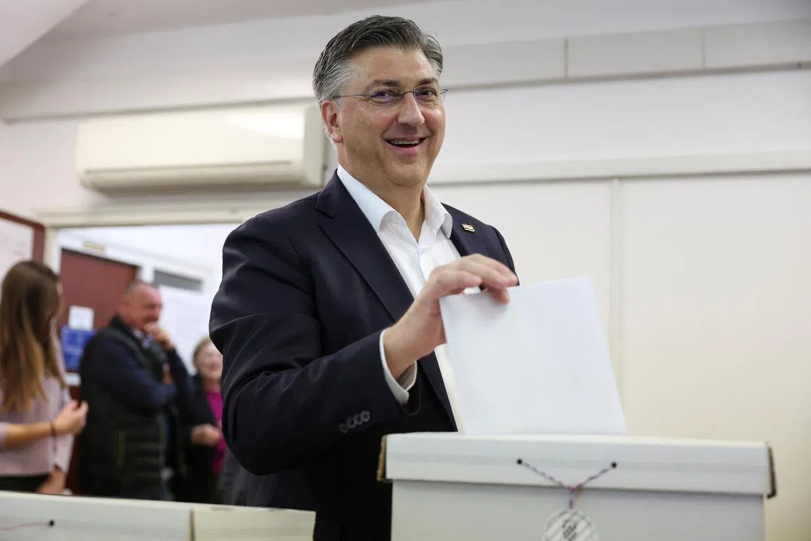 FILE PHOTO: Croatian Prime Minister and Croatian Democratic Union (HDZ) party's President Andrej Plenkovic votes in the parliamentary election at a polling station in Zagreb, Croatia, April 17, 2024. REUTERS/Marko Djurica/File Photo