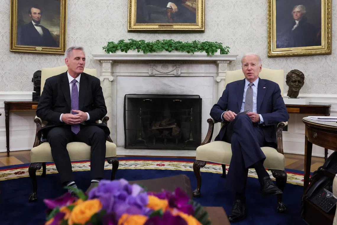 FILE PHOTO: House Speaker Kevin McCarthy (R-CA) sits for debt limit talks with U.S. President Joe Biden in the Oval Office at the White House in Washington, U.S., May 22, 2023. REUTERS/Leah Millis/File Photo