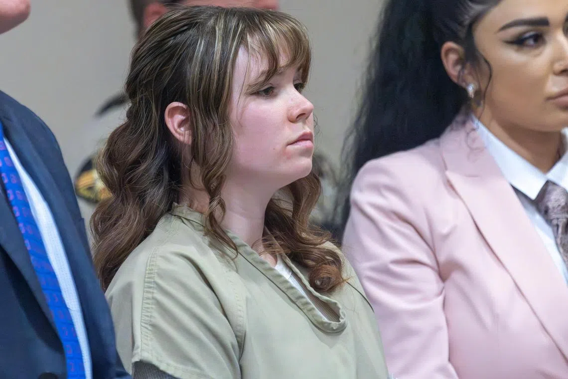 Hannah Gutierrez stands in front of the judge as she listens during her sentencing hearing.