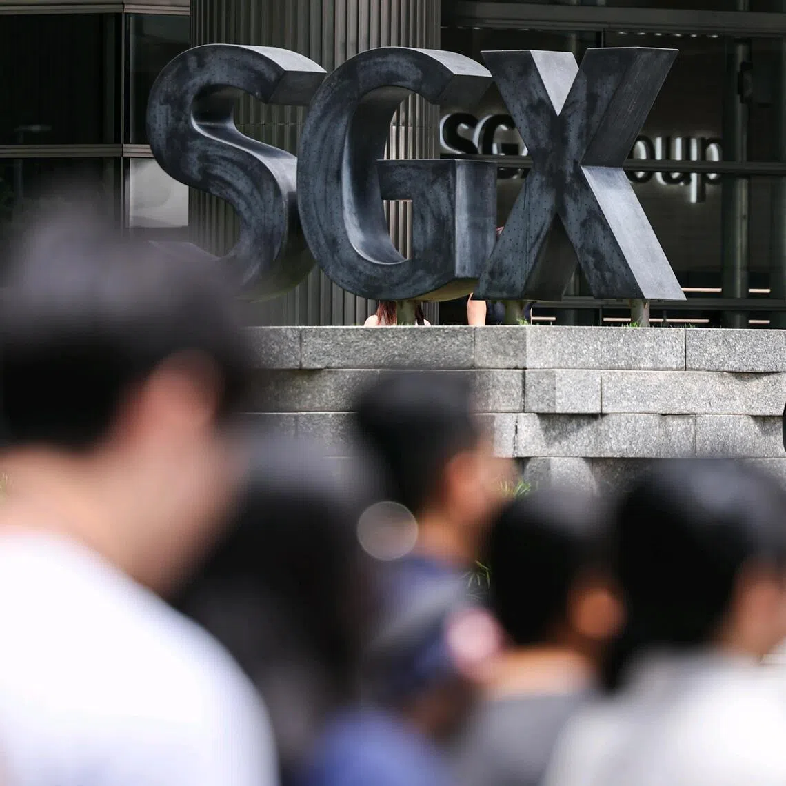 Chua Chwee Choo and two others were charged for allegedly conspiring to make false representations to auditors. 