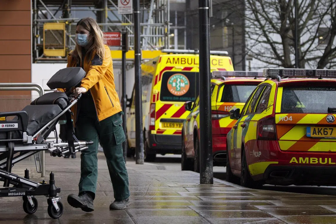 epa10395965 An ambulance crew outside The Royal London Hospital in London, Britain, 08 January 2023. As NHS (National Health Service) faces one of the worst winters in its history with over seven million people waiting for hospital treatment, ambulance workers and nurses will be taking more industrial strike actions in January. British Prime Minister Rishi Sunak signalled for the first time a possibility to negotiate a pay deal with nurses but repeatedly refused to answer if he uses private healthcare.  EPA-EFE/TOLGA AKMEN