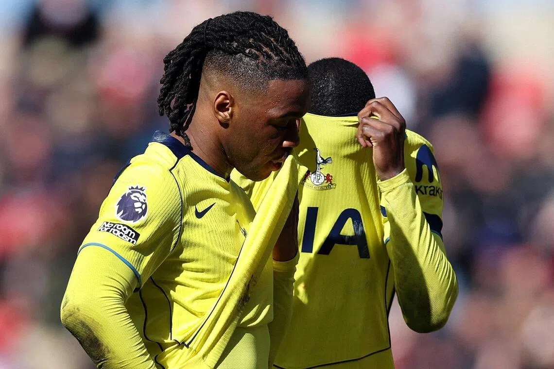 Tottenham Hotspur's Destiny Udogie (left) and Randal Kolo Muani looking dejected after Nordi Mukiele scores Sunderland's winner in their 1-0 home triumph at the Stadium of Light on April 12, 2026.    