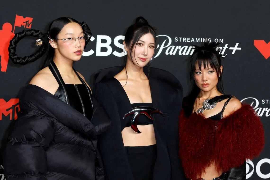 (From left) Audrey Nuna, Ejae and Rei Ami pose on the red carpet at the 2025 MTV Video Music Awards in Elmont, New York, US on Sept 7, 2025. 
