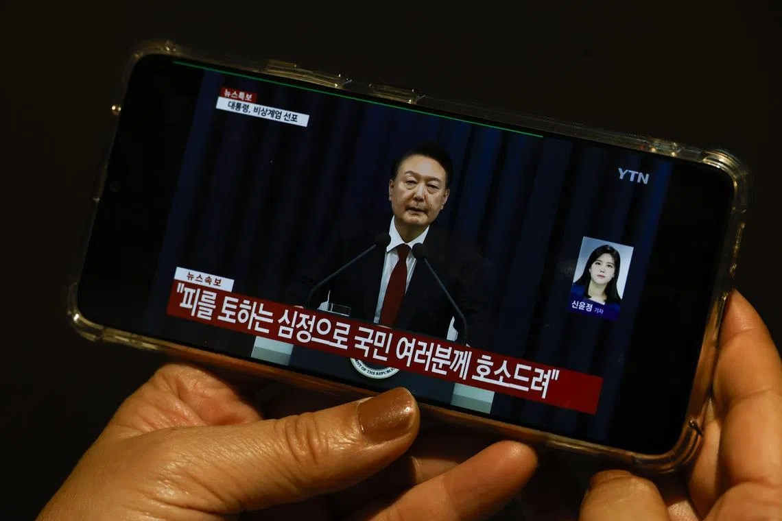 South Korean President Yoon Suk Yeol declaring martial law in a televised emergency address on Dec 3.