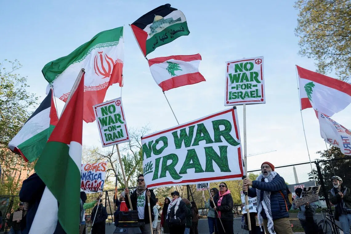 People protesting against military action in Iran near the White House in Washington, D.C., on April 8.