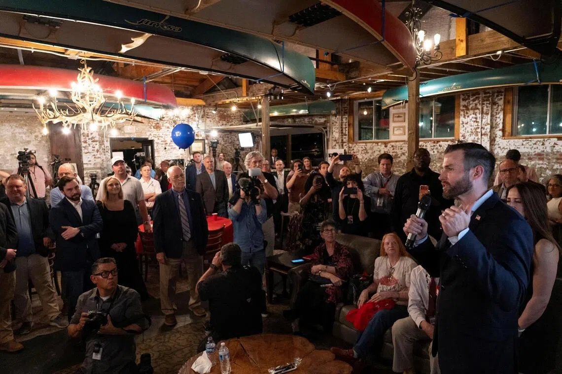 Georgia congressional candidate Clay Fuller speaks after the voting results were announced during his watch night party in Rome, Georgia.