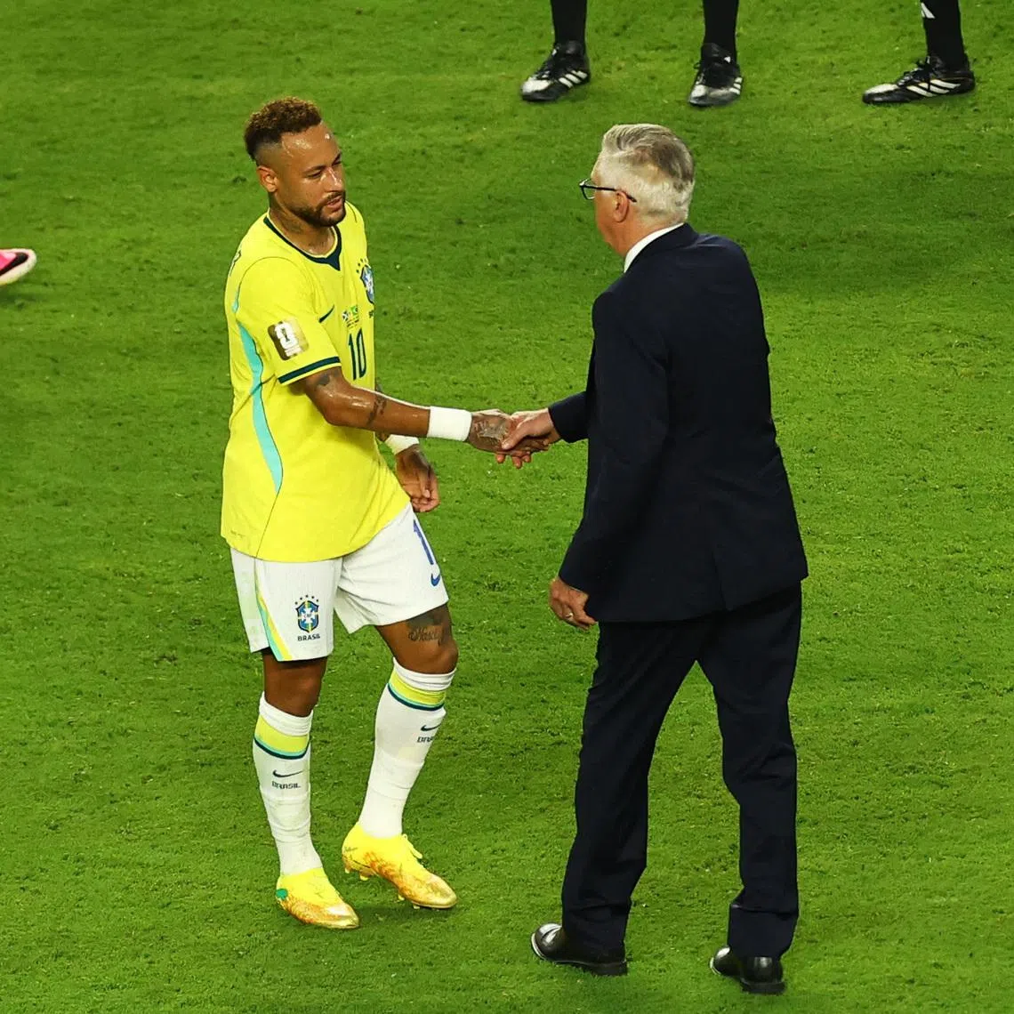 Soccer Football - FIFA World Cup 2026 - Group C - Scotland v Brazil - Miami Stadium, Miami Gardens, Florida, U.S. - June 24, 2026 Brazil's Neymar Jr. shakes hands with coach Carlo Ancelotti after the match REUTERS/Marco Bello